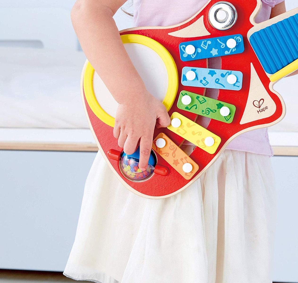 Hape - 6-in-1 Wooden Guitar-Shaped Music Maker Toy